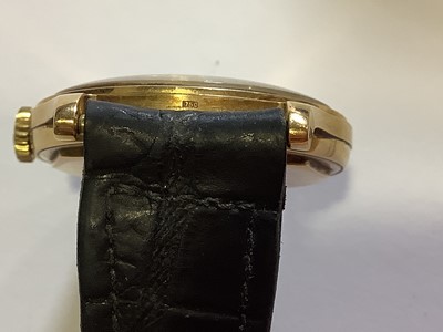 Lot 309 - Patek Philippe - a gentleman's yellow metal wristwatch.