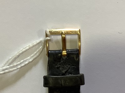 Lot 309 - Patek Philippe - a gentleman's yellow metal wristwatch.