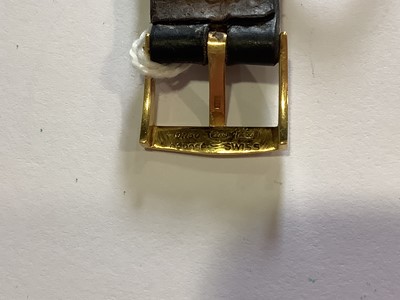 Lot 309 - Patek Philippe - a gentleman's yellow metal wristwatch.