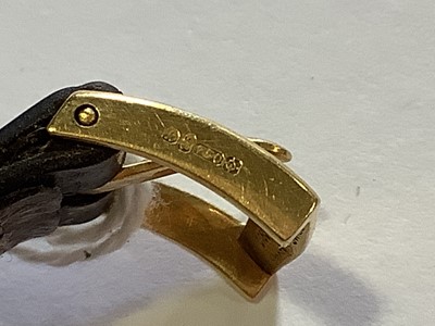Lot 309 - Patek Philippe - a gentleman's yellow metal wristwatch.