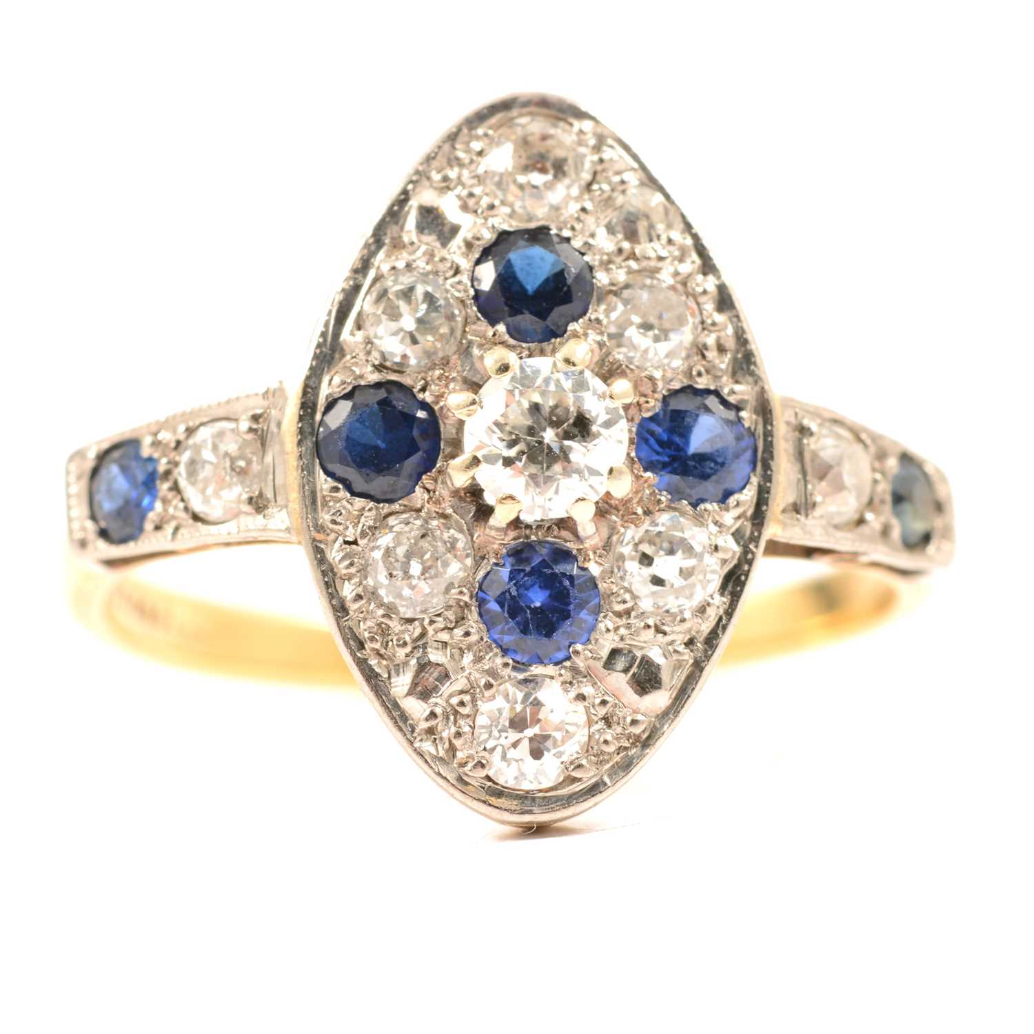 Lot 46 - A sapphire and diamond marquise cluster ring.