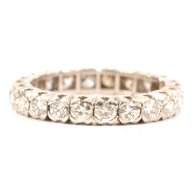 Lot 36 - A diamond full eternity ring.