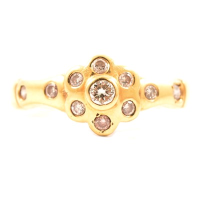 Lot 30 - A diamond dress ring.