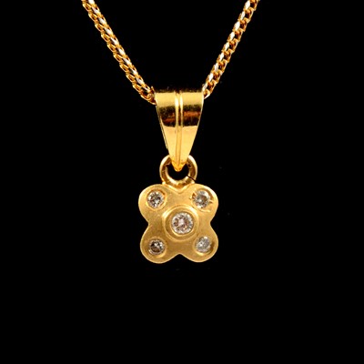 Lot 31 - A diamond pendant and chain.
