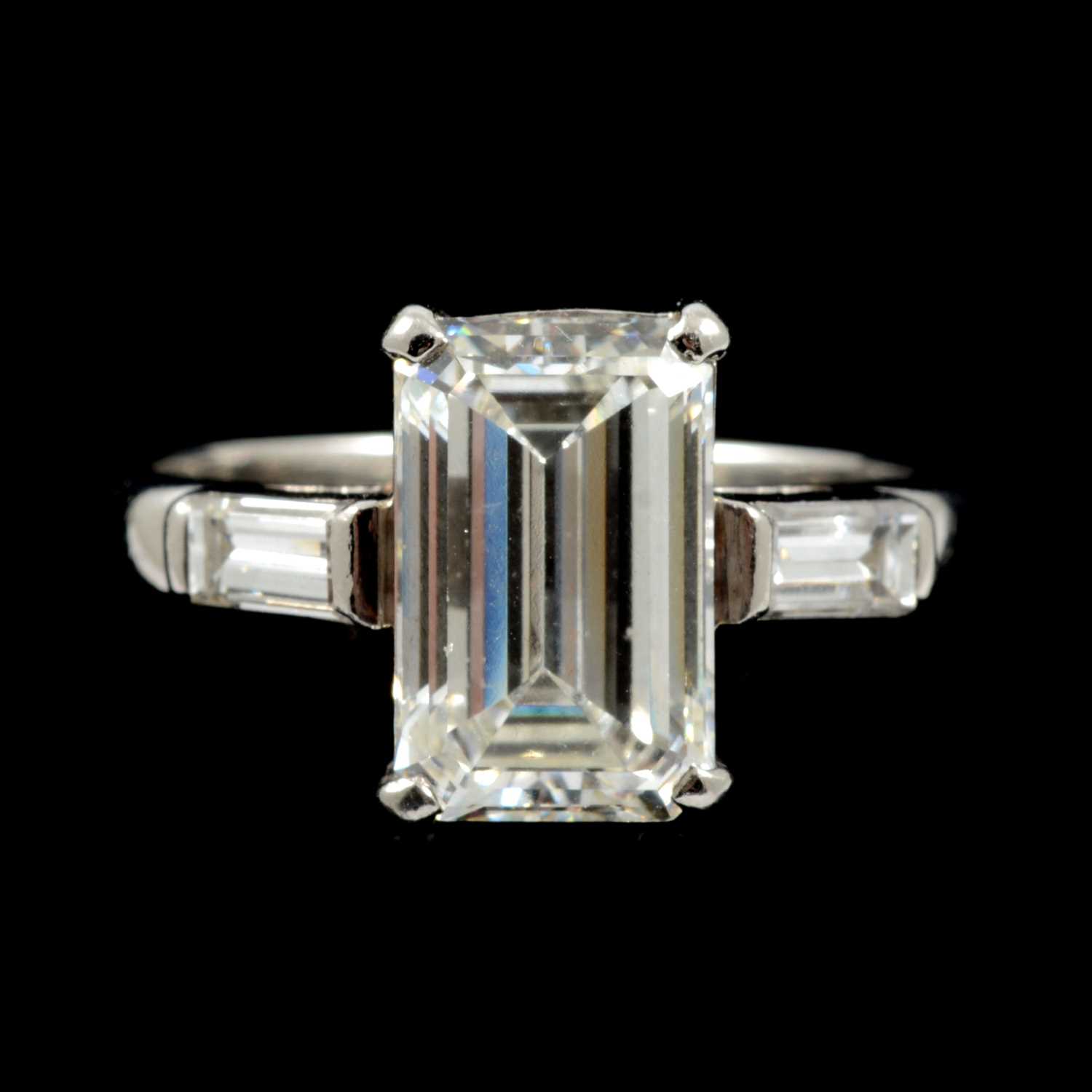 Lot 15 - A diamond solitaire ring, emerald step cut stone, 2.62 carats.