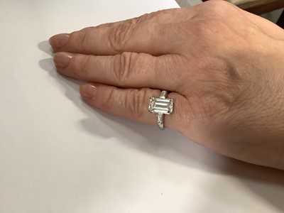 Lot 15 - A diamond solitaire ring, emerald step cut stone, 2.62 carats.