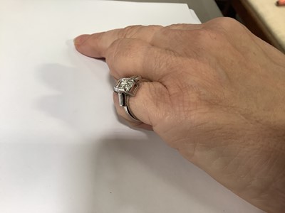 Lot 15 - A diamond solitaire ring, emerald step cut stone, 2.62 carats.