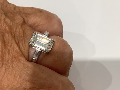 Lot 15 - A diamond solitaire ring, emerald step cut stone, 2.62 carats.