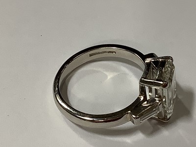 Lot 15 - A diamond solitaire ring, emerald step cut stone, 2.62 carats.