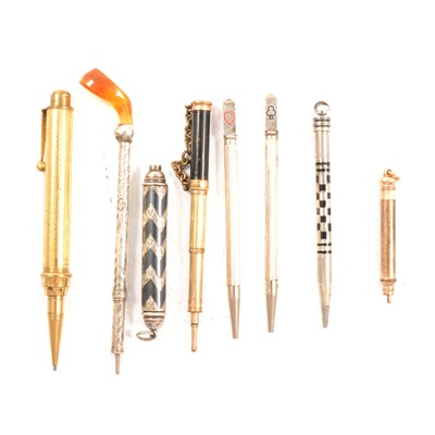 Lot 350A - Three gold-plated, and five silver / white metal propelling / retractable pencils.