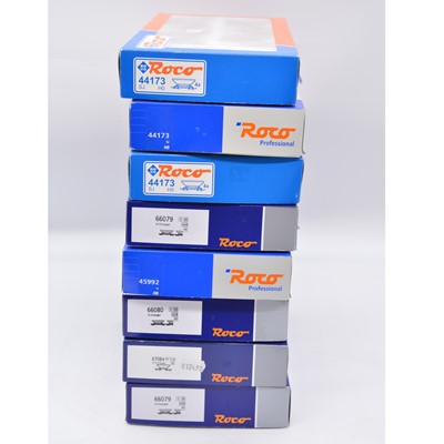 Lot 108 - Eight Roco HO gauge model railway wagon sets, packs of four.