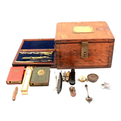 Lot 376 - A oak box with two Post Office money boxes, compass, drawing set etc.