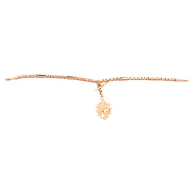 Lot 271 - A rose metal double Albert watch chain with medallion.