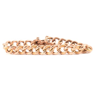 Lot 335 - A yellow metal hollow curb link bracelet.