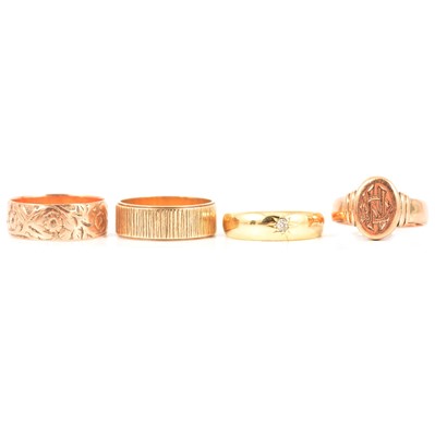 Lot 268 - Two 9 carat gold wedding bands, a diamond star gypsy set ring, signet ring.