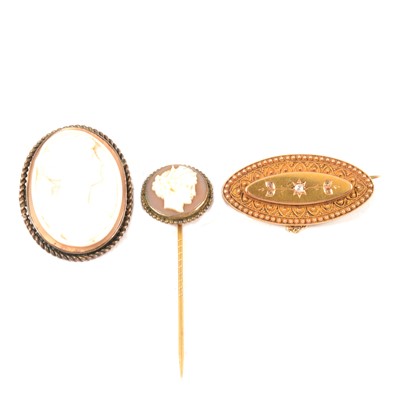 Lot 325 - A Victorian 15 carat diamond set etruscan bar brooch, cameo pin and cameo brooch.