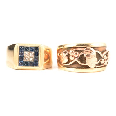 Lot 265 - Two dress rings, one with red gold detail the other set with sapphire and small diamonds.