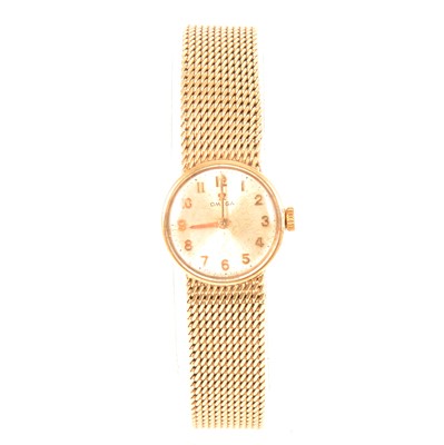 Lot 394 - Omega - a lady's 9 carat yellow gold bracelet watch.