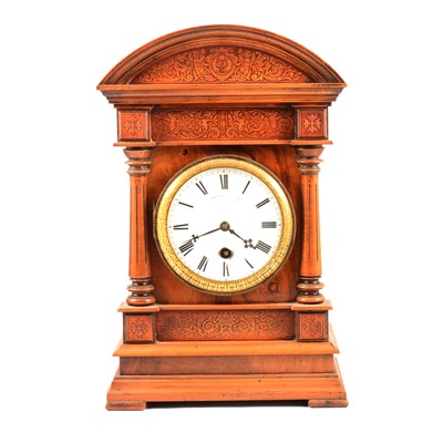 Lot 488 - Victorian walnut domed top mantel clock