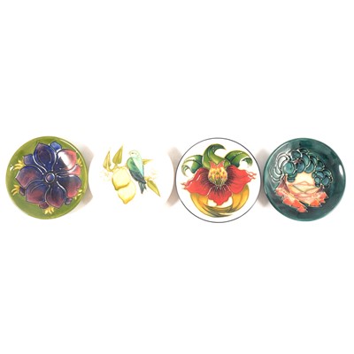 Lot 7 - Moorcroft Pottery - Four trinket dishes.
