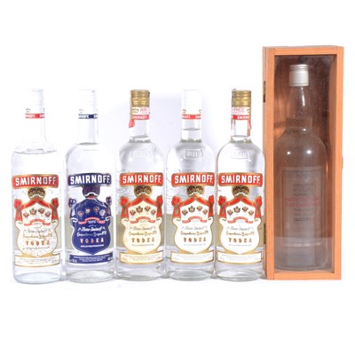 Lot 553 - Five bottlings of Smirnoff vodka, and another presentation bottle of vodka