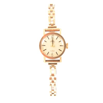 Lot 392 - Swiss Empress - a lady's 9 carat yellow gold bracelet watch.