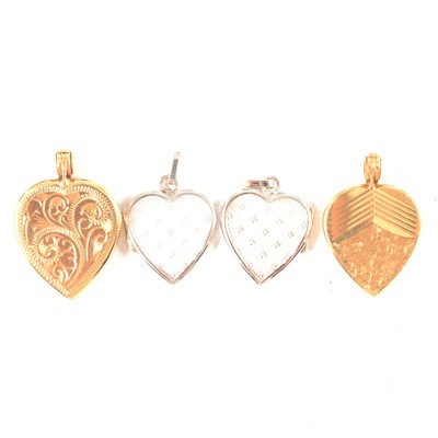 Lot 312 - Two 14 carat yellow gold heart shape lockets and two white metal heart shape lockets.