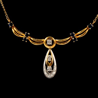 Lot 306 - A sapphire and diamond necklet.