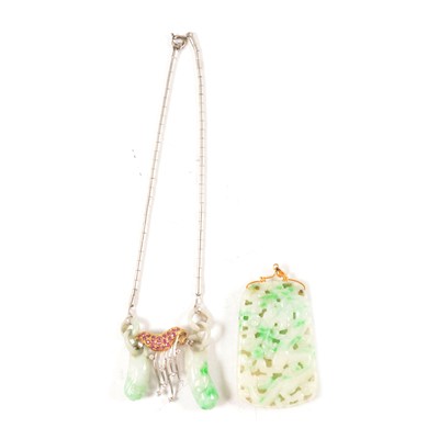 Lot 310 - A carved jade pendant, and a carved jade, red and white stone necklet.
