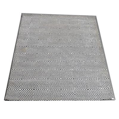 Lot 584 - Modern geometric wool rug, retailed by Heals