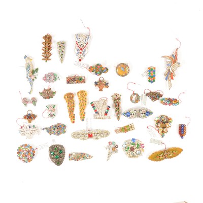 Lot 374 - Thirty-four multi coloured paste set brooches and clips, circa 1930/1950.