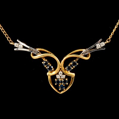 Lot 305 - A sapphire and diamond necklet.