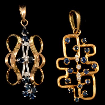 Lot 307 - Two sapphire and diamond pendants.