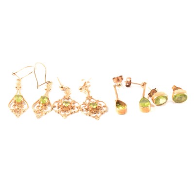 Lot 296 - Four pairs of peridot earrings for pierced ears.
