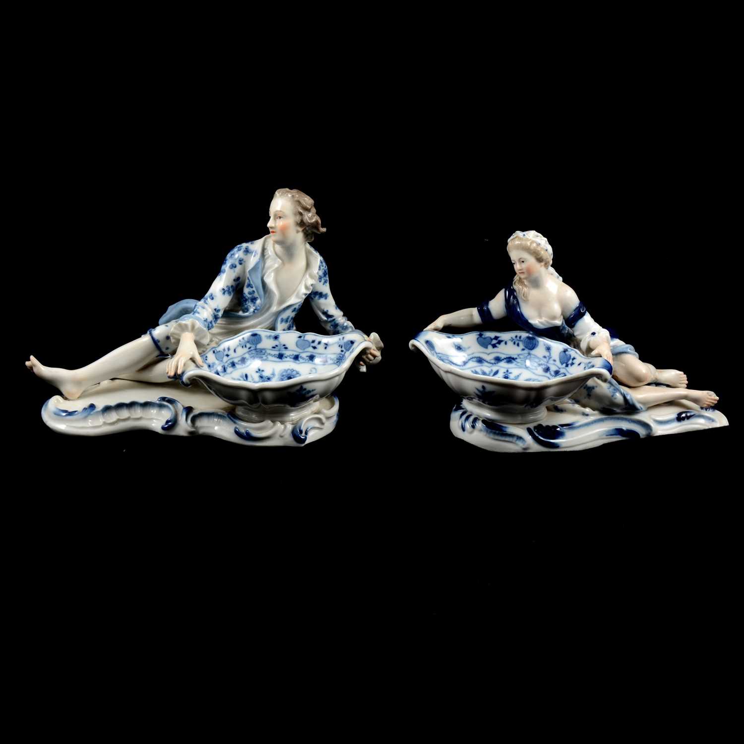 Lot 17 - Near pair of Meissen porcelain figural table salts, late 19th / early 20th century