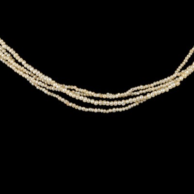 Lot 328A - A four strand fine seed pearl necklace with hair locket clasp.