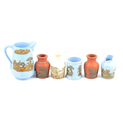 Lot 15 - Two trays of Victorian blue and brown jars and jugs.