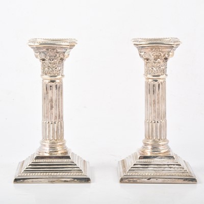 Lot 189 - Pair of silver Corinthian column candlesticks