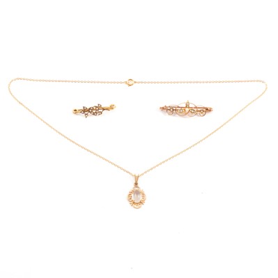 Lot 266 - Two seed pearl brooches and a moonstone pendant.