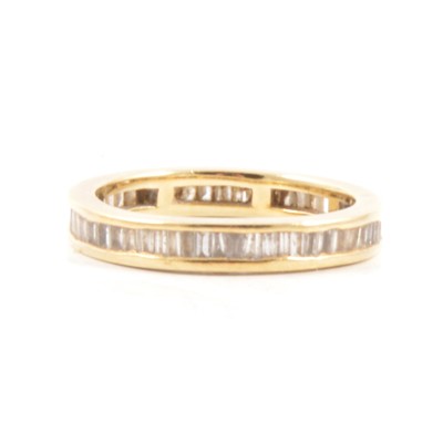 Lot 31 - A diamond full eternity ring.