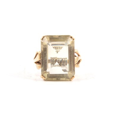 Lot 80 - A pale citrine dress ring.