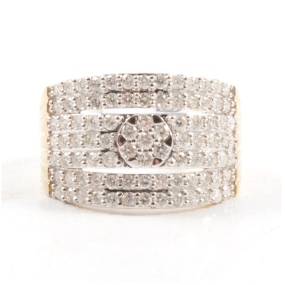 Lot 36 - A wide diamond half hoop ring.