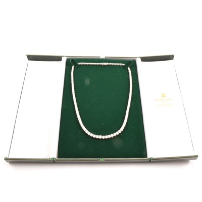 Lot 201 - A diamond Riviere necklace, approximately 20 carats.