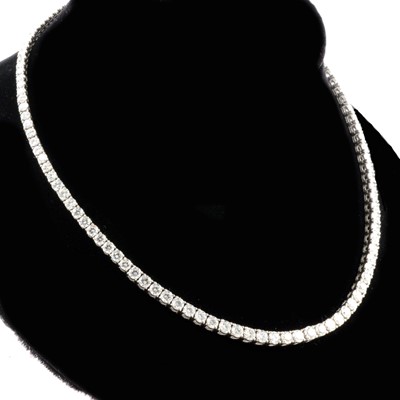 Lot 201 - A diamond Riviere necklace, approximately 20 carats.