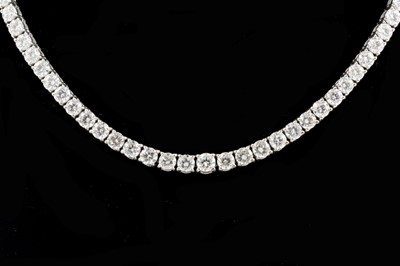 Lot 201 - A diamond Riviere necklace, approximately 20 carats.