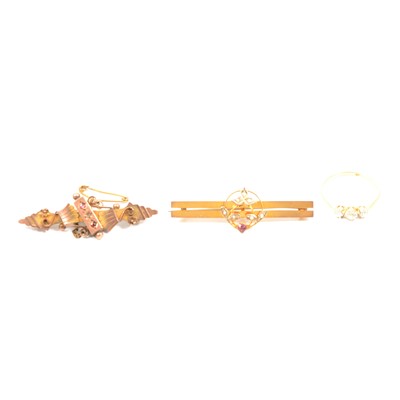 Lot 65 - A diamond three stone ring and two bar brooches.