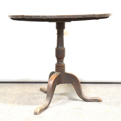 Lot 372 - George III oak tripod table