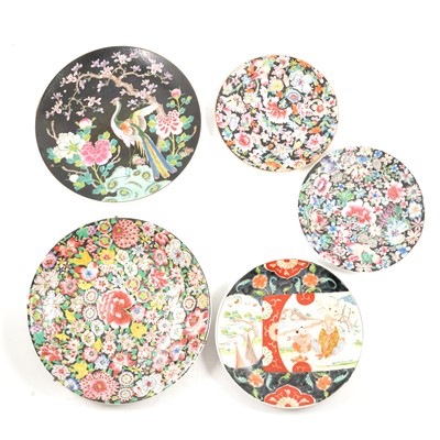 Lot 36 - Japanese porcelain charger, black ground, and three similar