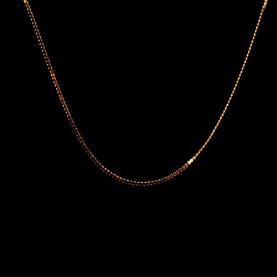 Lot 109 - A yellow metal chain link necklace.