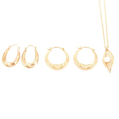 Lot 82 - A simulated pearl pendant and chain, two pairs of hoop earrings.